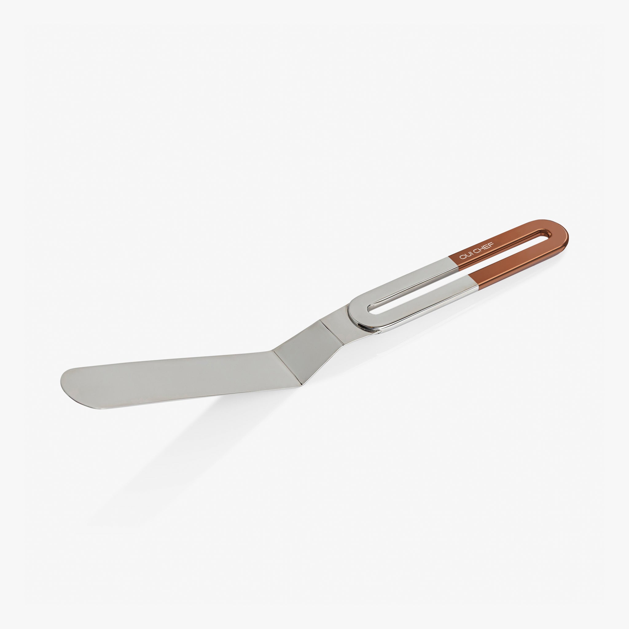 Stainless steel large palette knife with a copper top handle sitting against a white background.