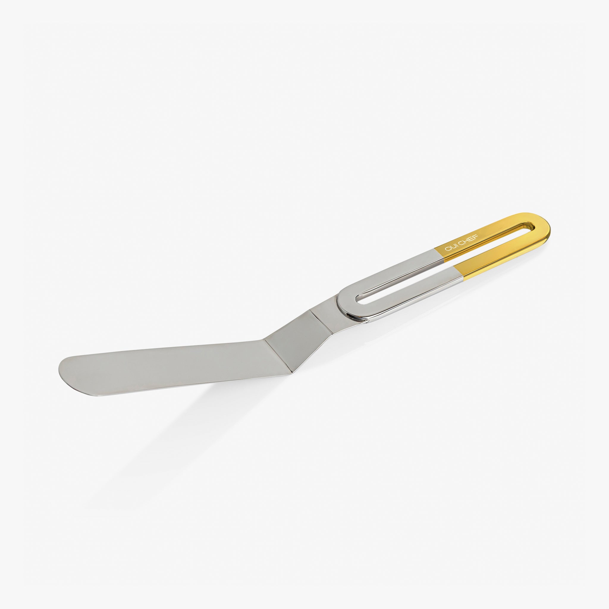 Stainless steel large palette knife with a Gold top handle sitting against a white background.