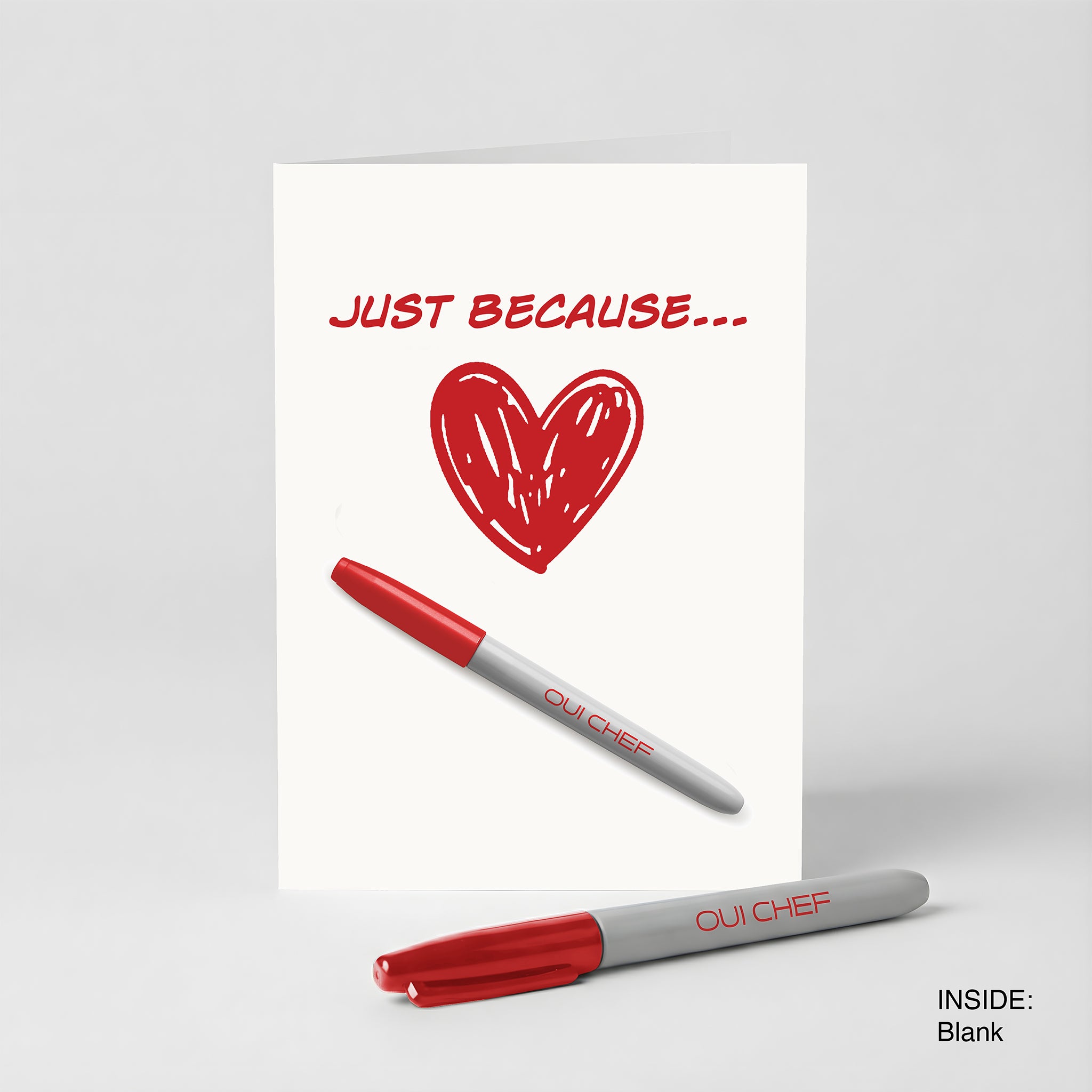 Valentines card with 'Just Because' text and a red Sharpie on a white background.